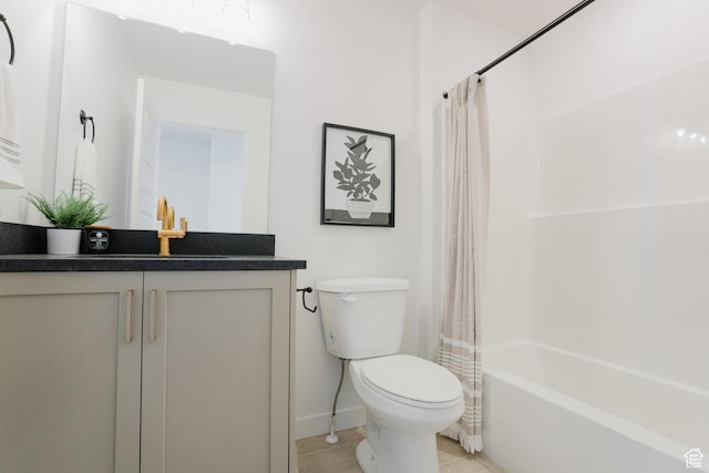 full bath featuring shower / tub combo, baseboards, toilet, vanity, and tile patterned floors