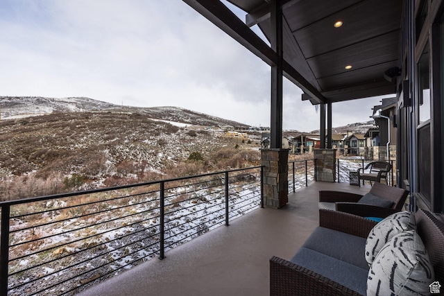 12709 N Belaview Way, Hideout, UT 84036 - snow covered back of property with a mountain view