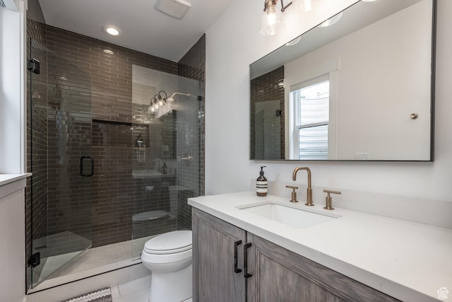 12709 N Belaview Way, Hideout, UT 84036 - bathroom featuring tile patterned flooring, vanity, a stall shower, and toilet