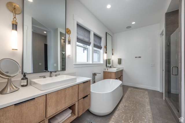 12709 N Belaview Way, Hideout, UT 84036 - full bathroom featuring a freestanding tub, a sink, recessed lighting, two vanities, and a stall shower