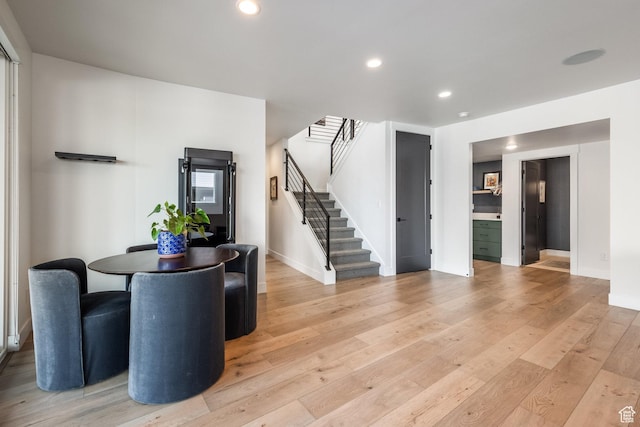 12709 N Belaview Way, Hideout, UT 84036 - dining area with recessed lighting, light wood-type flooring, stairway, and baseboards