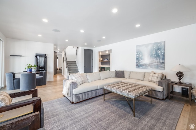 12709 N Belaview Way, Hideout, UT 84036 - living room featuring light wood-style flooring, recessed lighting, and stairway