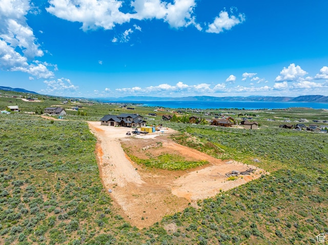 3525 S Sweetwater Pkwy, Garden City, UT 84028 - aerial view of property and surrounding area featuring a water and mountain view