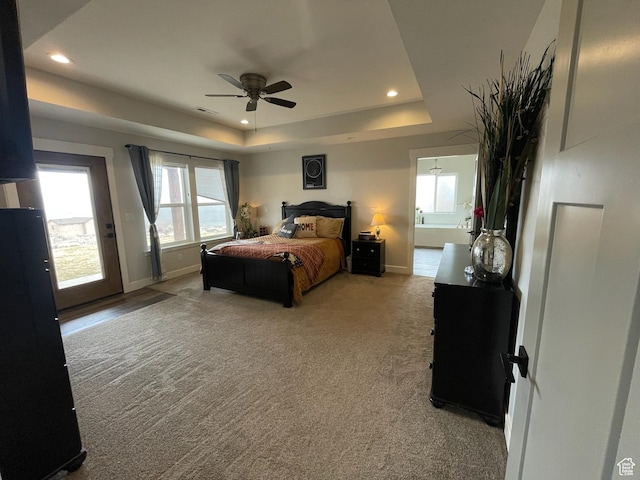 3525 S Sweetwater Pkwy, Garden City, UT 84028 - bedroom with a tray ceiling, recessed lighting, carpet, and ceiling fan