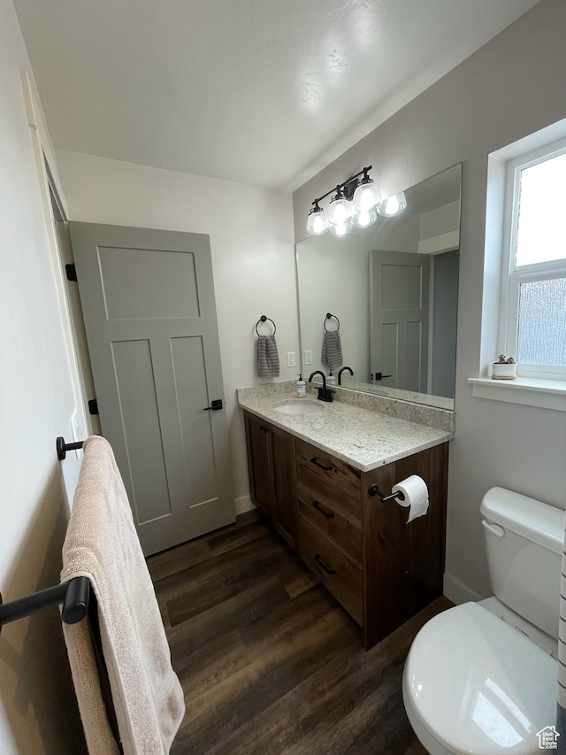 3525 S Sweetwater Pkwy, Garden City, UT 84028 - bathroom featuring vanity and wood finished floors