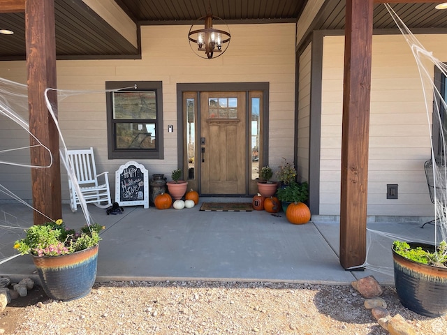 3525 S Sweetwater Pkwy, Garden City, UT 84028 - entrance to property with a porch