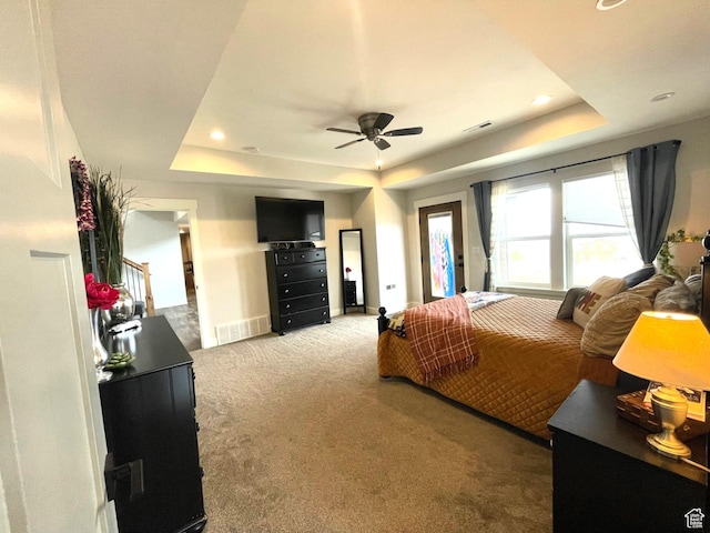 3525 S Sweetwater Pkwy, Garden City, UT 84028 - bedroom featuring a raised ceiling, carpet, recessed lighting, and a ceiling fan