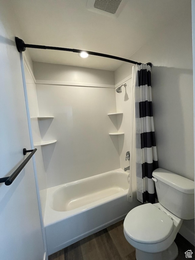 3525 S Sweetwater Pkwy, Garden City, UT 84028 - full bathroom with shower / tub combo and wood finished floors