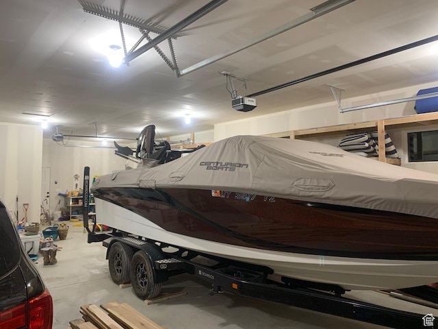 3525 S Sweetwater Pkwy, Garden City, UT 84028 - garage featuring a garage door opener