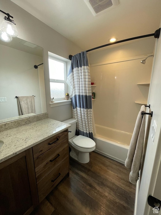 3525 S Sweetwater Pkwy, Garden City, UT 84028 - bathroom featuring vanity, shower / bathtub combination with curtain, and wood finished floors