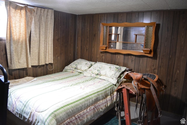 418 N 9th St, Montpelier, ID 83254 - bedroom featuring wood walls