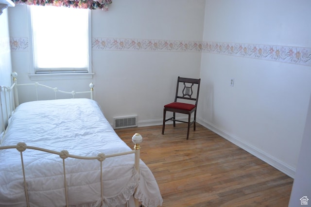 418 N 9th St, Montpelier, ID 83254 - bedroom with visible vents and wood finished floors