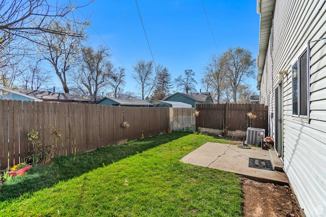 241 E Crestone Ave Unit 16A, South Salt Lake, UT 84115 - view of yard featuring a patio area, a fenced backyard, and central AC unit