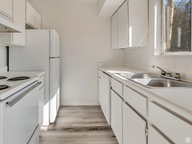241 E Crestone Ave Unit 16A, South Salt Lake, UT 84115 - kitchen with white cabinets, a sink, light countertops, white appliances, and under cabinet range hood