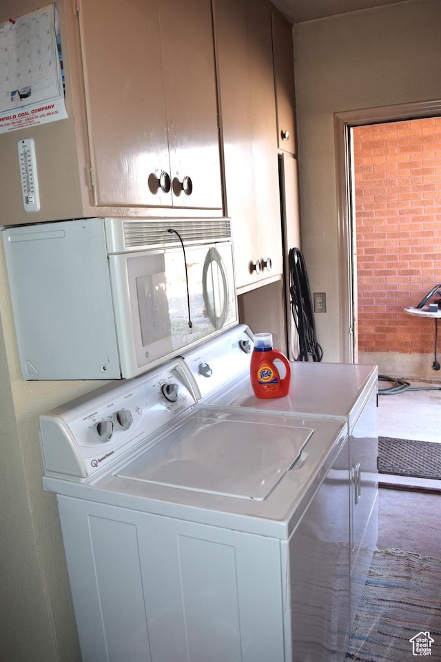 255 S Center St, Circleville, UT 84723 - washroom featuring separate washer and dryer and cabinet space