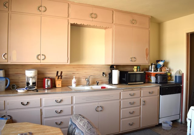 255 S Center St, Circleville, UT 84723 - kitchen featuring a sink, light countertops, black microwave, and white dishwasher