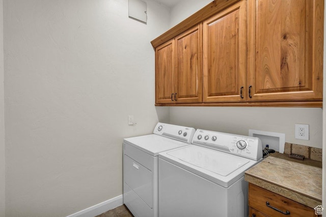 2090 N Tuweap Dr Unit 2, St George, UT 84770 - laundry area featuring separate washer and dryer, baseboards, and cabinet space