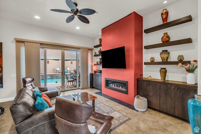 2090 N Tuweap Dr Unit 2, St George, UT 84770 - living room featuring a glass covered fireplace, baseboards, recessed lighting, light tile patterned floors, and a ceiling fan