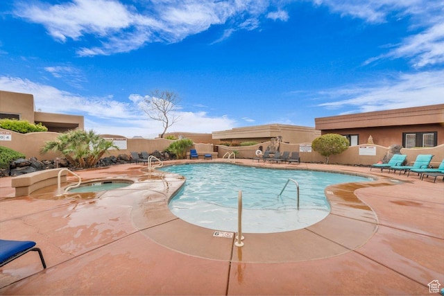 2090 N Tuweap Dr Unit 2, St George, UT 84770 - community pool with fence, a patio, and a community hot tub