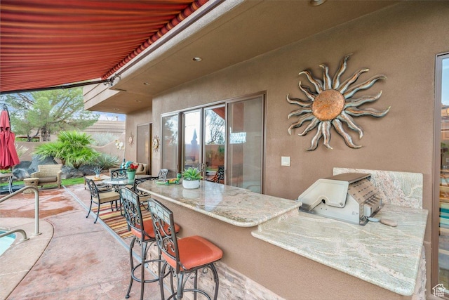2090 N Tuweap Dr Unit 2, St George, UT 84770 - view of patio featuring an outdoor kitchen and outdoor wet bar
