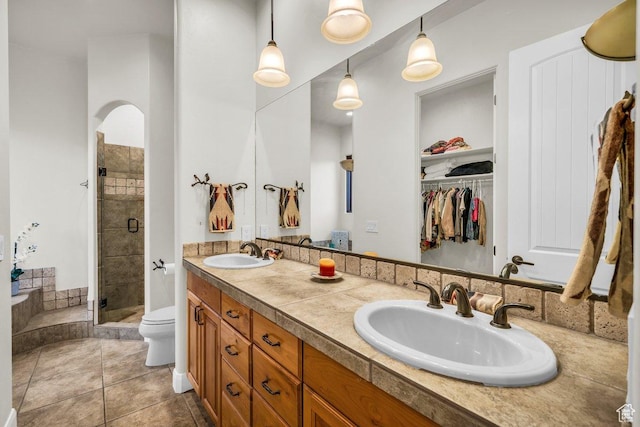 2090 N Tuweap Dr Unit 2, St George, UT 84770 - full bathroom with a sink, tile patterned flooring, a shower stall, and double vanity