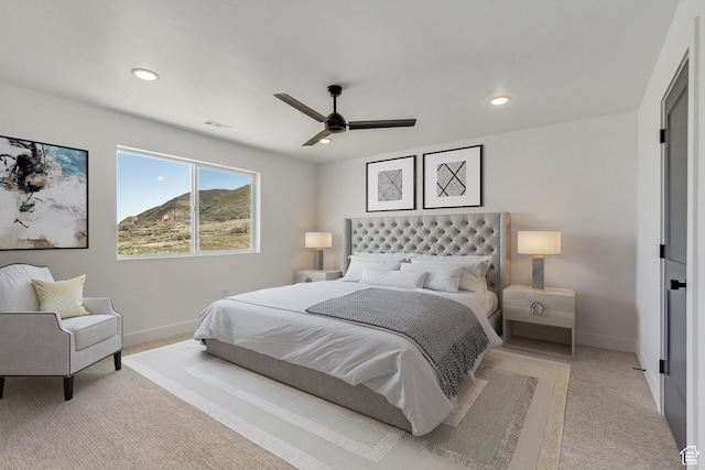 bedroom with light colored carpet, baseboards, a ceiling fan, and recessed lighting