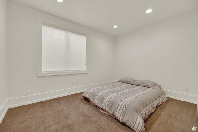 bedroom featuring baseboards, recessed lighting, and carpet flooring