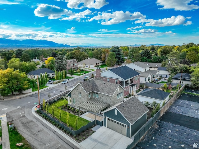 aerial view with a residential view and a mountain view