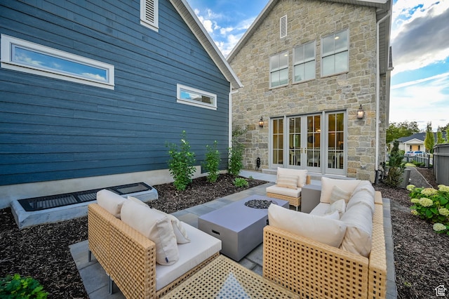 view of patio / terrace featuring french doors, fence, and an outdoor hangout area