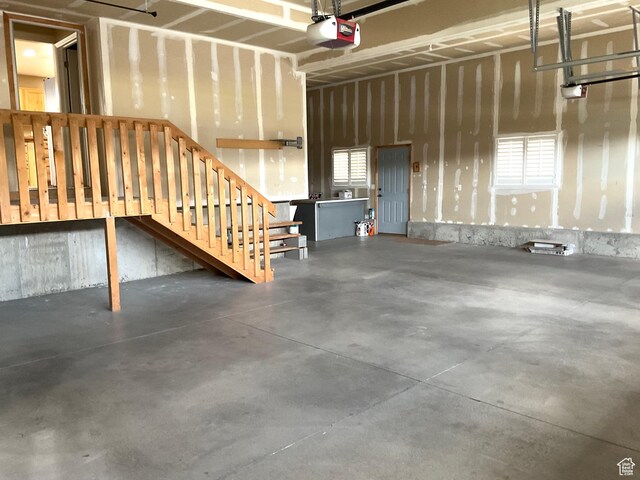 2461 N 2710 W, Clinton, UT 84015 - garage featuring a garage door opener