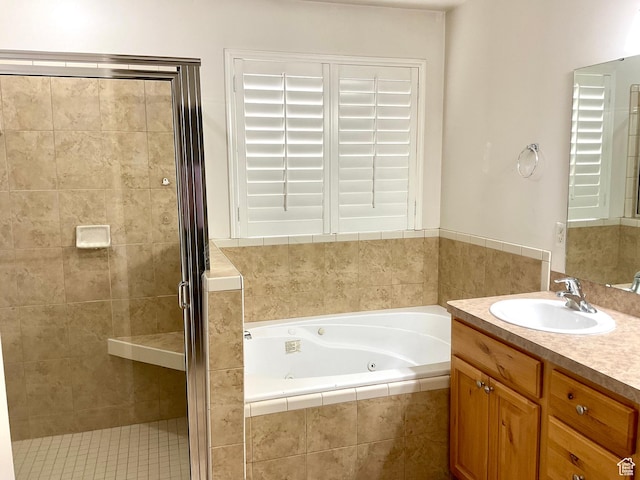 2461 N 2710 W, Clinton, UT 84015 - bathroom with a tub with jets, a stall shower, and vanity