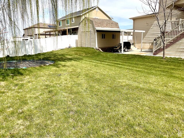 2461 N 2710 W, Clinton, UT 84015 - view of yard featuring an outbuilding, a patio, and a storage unit