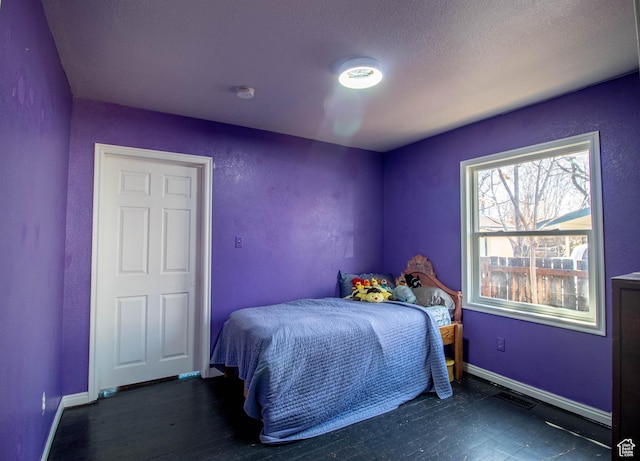 180 E Southgate Ave S, Salt Lake City, UT 84115 - bedroom featuring baseboards, a textured ceiling, and wood finished floors
