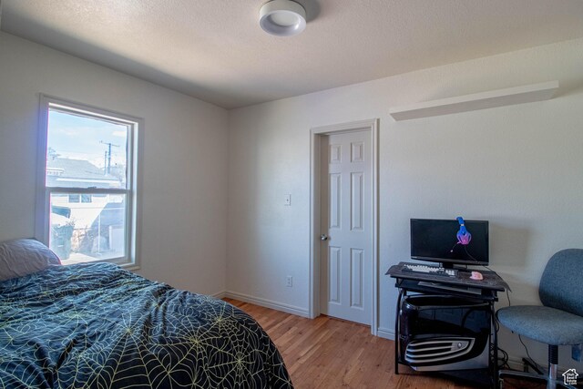 180 E Southgate Ave S, Salt Lake City, UT 84115 - bedroom featuring light wood-style floors and baseboards