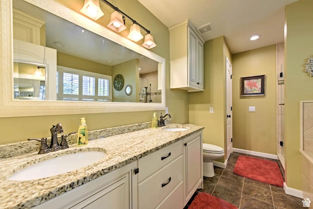 1050 S 200 W, Wellsville, UT 84339 - full bath with a shower stall, visible vents, a sink, and toilet