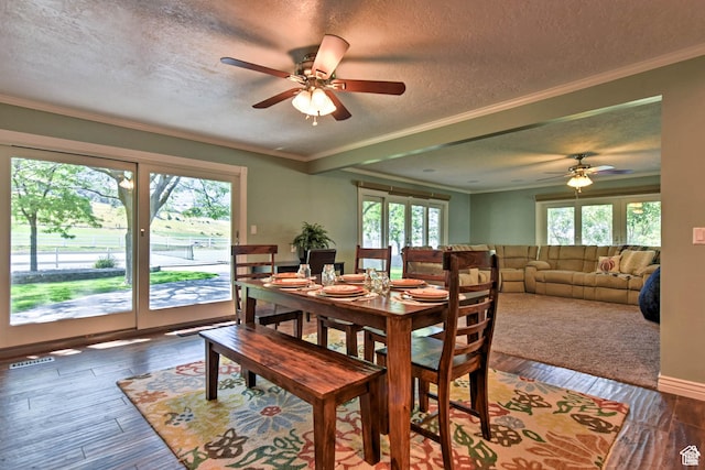 1050 S 200 W, Wellsville, UT 84339 - dining space featuring a textured ceiling, wood finished floors, ceiling fan, and ornamental molding