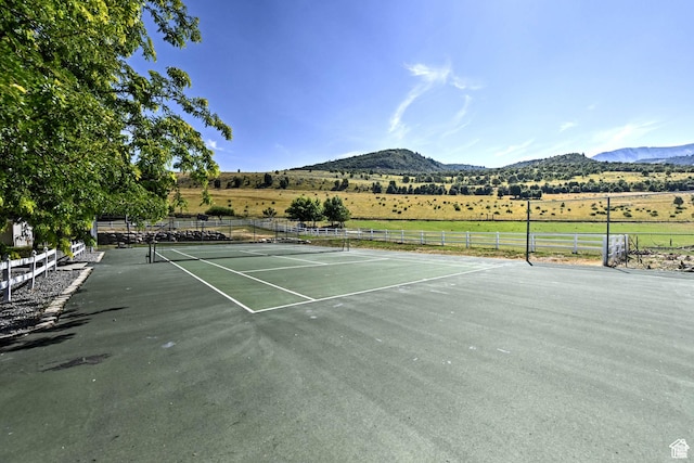 1050 S 200 W, Wellsville, UT 84339 - view of sport court with fence, a mountain view, and a rural view