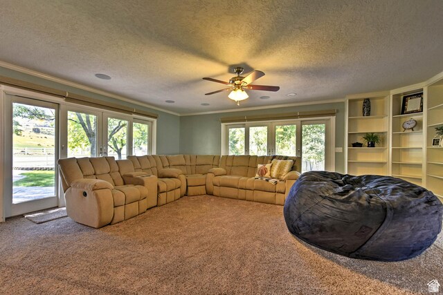 1050 S 200 W, Wellsville, UT 84339 - carpeted living room featuring ceiling fan, a textured ceiling, crown molding, and a healthy amount of sunlight