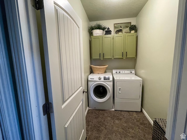 washroom featuring baseboards, cabinet space, dark carpet, and independent washer and dryer