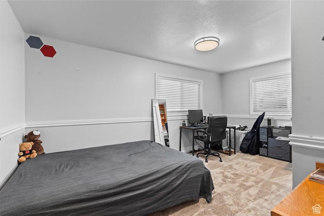 bedroom featuring carpet flooring