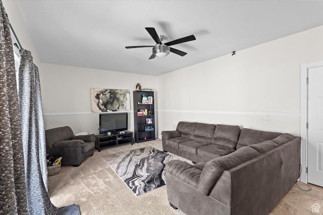living room featuring a ceiling fan