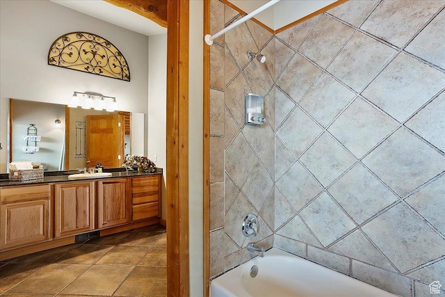 bathroom featuring tile patterned flooring, vanity, bathtub / shower combination, and visible vents