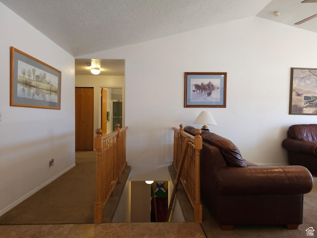 149 Toponce Dr, Evanston, WY 82930 - living room with carpet flooring, a textured ceiling, and lofted ceiling