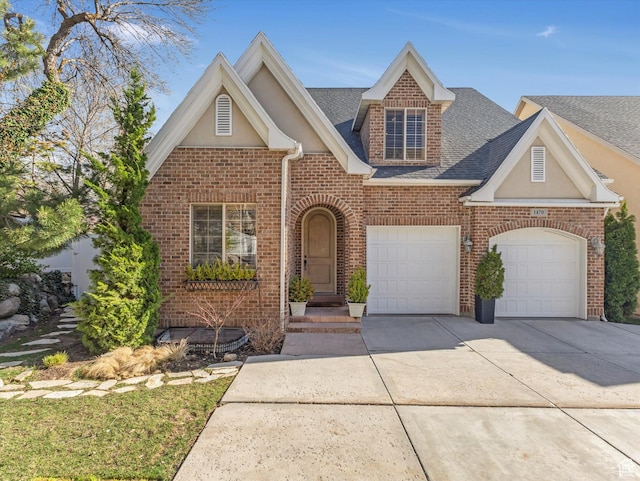 view of front of house with a garage, brick siding, driveway, and a shingled roof