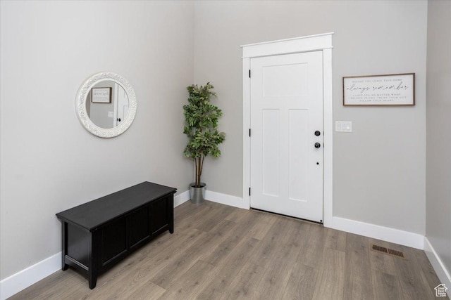 1379 E Hollyhock Ct, Layton, UT 84040 - entryway featuring visible vents, baseboards, and light wood-style floors