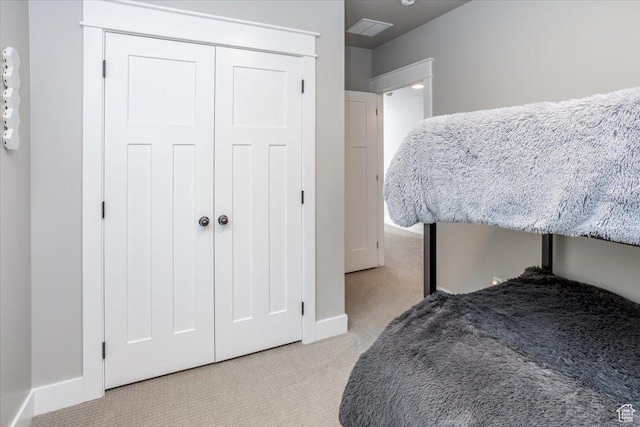 1379 E Hollyhock Ct, Layton, UT 84040 - bedroom with a closet, visible vents, light colored carpet, and baseboards
