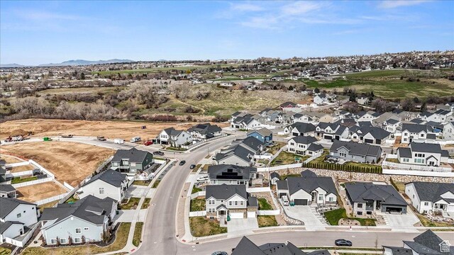 1379 E Hollyhock Ct, Layton, UT 84040 - drone / aerial view featuring a residential view