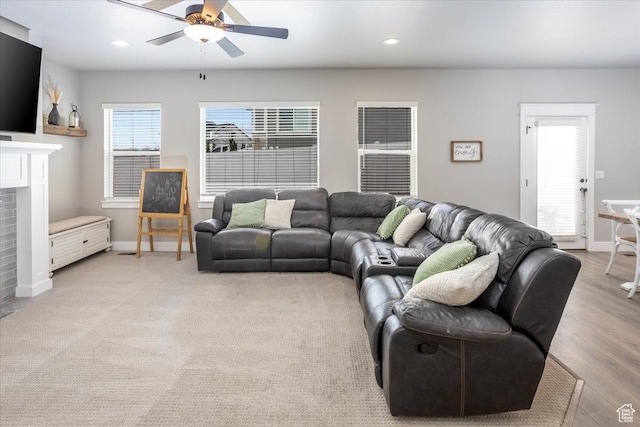 1379 E Hollyhock Ct, Layton, UT 84040 - living room with recessed lighting, a fireplace, a ceiling fan, and a wealth of natural light