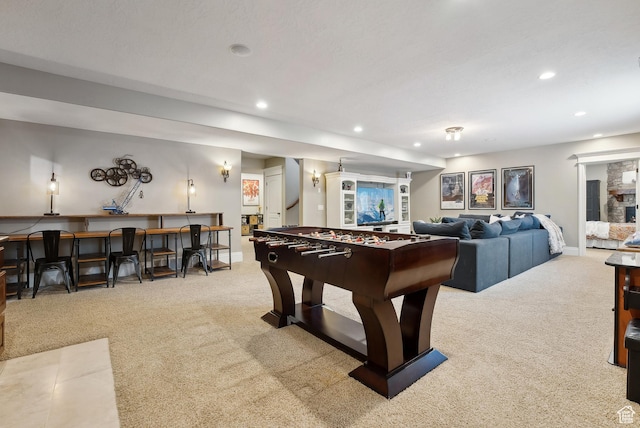 rec room with carpet floors, baseboards, and recessed lighting