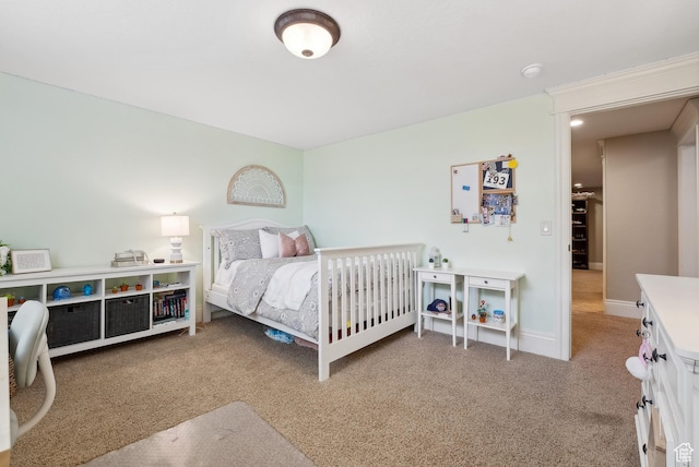 bedroom with light carpet